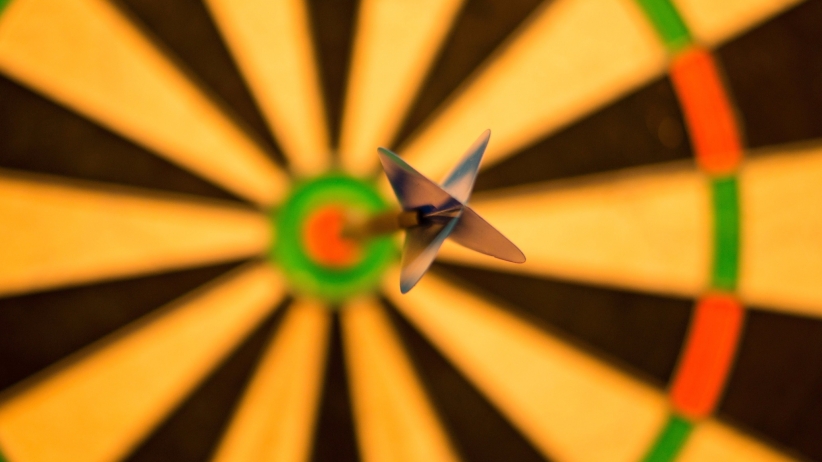 image of dart hitting the board